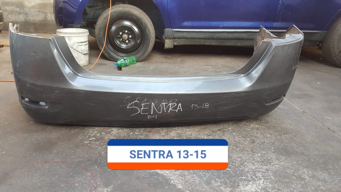 PARACHOQUES POSTERIOR NISSAN SENTRA 2013 AL 2015 CON DETALLE